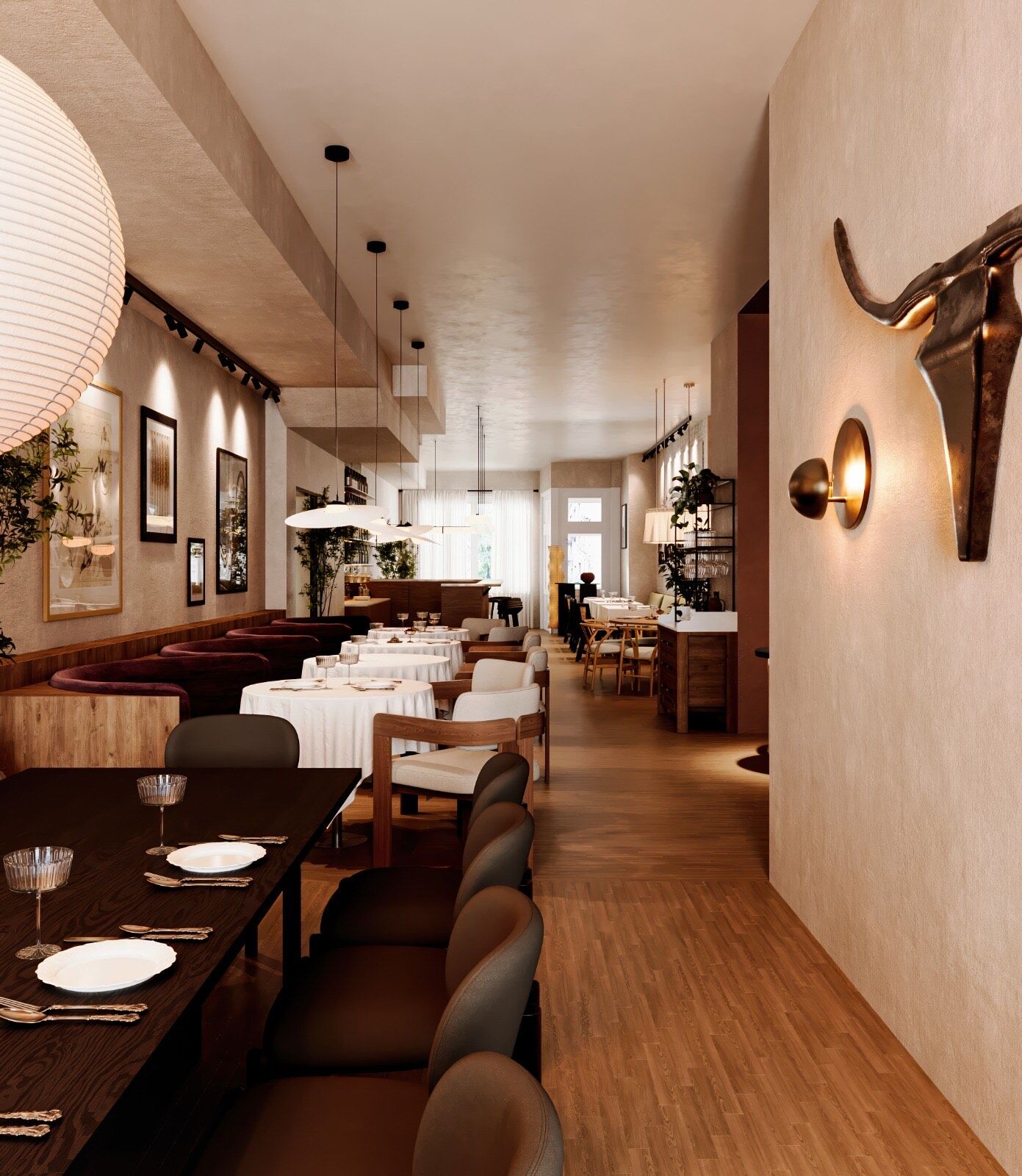 Sesilya’s main dining room — leather banquettes, paper lanterns, and warm plaster walls